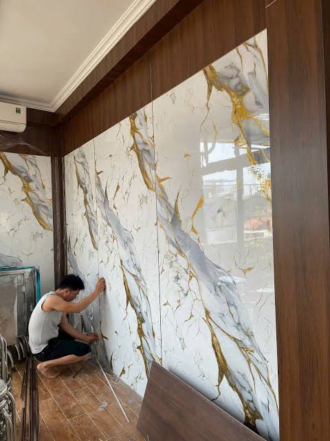 Thi công tấm ốp than tre